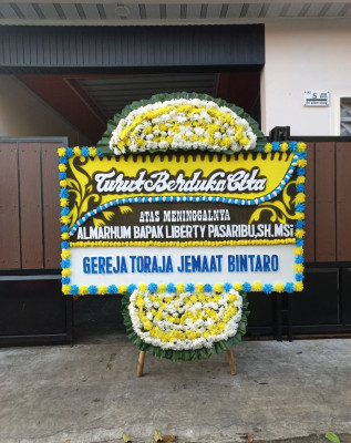 Papan Bunga Duka di Tanah Putih Tanjung Melawan